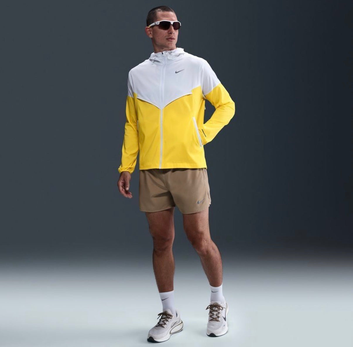 Nike Impossibly Light Windrunner jacket in a white and yellow colorway
